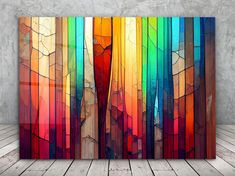 an abstract painting with multicolored lines on the wall and wood flooring in front of it