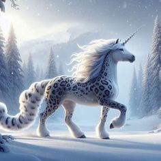 a white and black unicorn in the snow