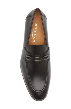 A sophisticated loafer crafted in Spain from flexible leather is elevated with a chain-inspired bit made of high-polish metal. Cushioned insole Leather upper and lining/rubber and leather sole Made in Spain Elegant Moc Toe Business Moccasins, Elegant Formal Moccasins With Leather Sole, Elegant Calf Leather Loafers For Semi-formal Occasions, Elegant Business Loafers In Calf Leather, Elegant Calf Leather Moccasins For Formal Occasions, Elegant Calf Leather Formal Loafers, Elegant Calf Leather Loafers For Business, Elegant Calf Leather Loafers For Formal Occasions, Elegant Leather Tassel Loafers For Formal Occasions