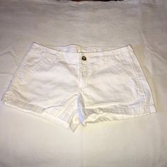 Nwot White Shorts. 4 Pocket With Button And Zipper Front Closure. Cotton/Spandex Mix Sz 7. Tags Removed And Never Worn. Inseam: 2 1/2" Waist: 30" Rise: 8" Dark Denim Shorts, High Rise Denim Shorts, Hem Jeans, Distressed Shorts, Arizona Jeans, Distressed Denim Shorts, High Rise Denim, Khaki Chinos, Pocket Jeans