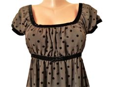 Vintage brown polka dots women's dress. Brand - Twin Set Simona Barbieri Made in Italy Material - polyester, poliamide, cotton lined Color - brown with black velvet trim Details - polka dots, empire waist, semi sheer, full lined, portrait neckline, black velvet trim, above the knees, Label size - S, it fits well size M. Measurements shoulder to shoulder approx 20''/51cm armpit to armpit 19''/49cm waist / empire waist/ 15''/39cm /elastic/ hip loose length 35''/90cm Very good condition 60s Empire Waist Dress, 90s Babydoll Dress Grunge, Brandy Melville Polka Dot Dress, Vintage Mini Dress In Polka Dot, 1960s Empire Waist Dress, Vintage V-neck Polka Dot Dress, Twin Set, Hair Clothes, Necklines For Dresses