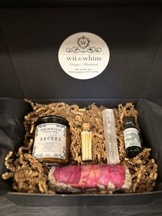 an open box filled with different types of wine