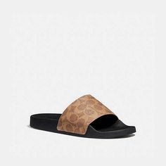 These laidback, sporty slides are crafted in our Signature canvas. The contoured footbed and rubber sole provide all-day comfort. Coach Slides, Xmas List, Leather Dress Shoes, Signature Canvas, Slide In, Monogrammed Items, Leather Dresses, Coach Leather, Dream Shoes