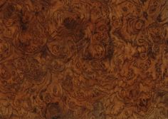 an image of wood textured with many different shapes and sizes on the top part of it