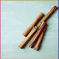 some cinnamon sticks are laying on the table