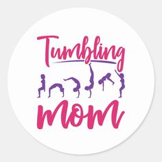 a round sticker with the words tumbling mom in pink and purple lettering on it