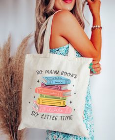 "So Many Books So Little Time Tote Bag, Canvas Tote Bag, Book Bag, Library Bag, Library Book Bag, Books Tote Bag, Bookish Tote Bag, Book Lover Gift BAG DIMENSIONS: Height: 15.75\" Width: 15.25\" Handle length: 21.5\" FABRIC: - 100% cotton sheeting - Reinforced handle CARE INSTRUCTIONS: Wash inside out with cold water. Air dry or tumble on low. PROCESSING AND SHIPPING: Processing time is 1-4 business days Shipping: average is 3-5 business days, depending on destination. Please see the shipping estimate based on your location. ALL SALES ARE FINAL: We are a print-on-demand shop which means that items are made special for you when you place the order, therefore we cannot accept returns or exchanges. Please read the description carefully before ordering. Please message me with any questions :) Bookish Rectangular Canvas Bag, Rectangular Canvas Bag With Bookish Style, Bookish School Bags With Letter Print, White Bookish Bag For Everyday Use, Books Tote Bag, Library Book Bag, Handpainted Tote Bags, Library Tote, Diy Tote