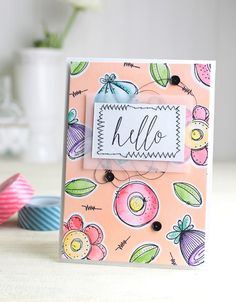 a handmade card with the word hello written on it