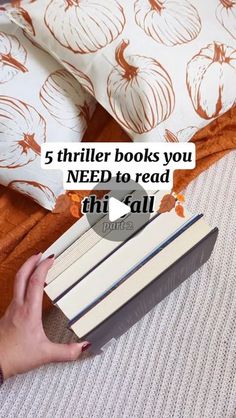 someone is reading a book on their bed with the caption, 5 thrilr books you need to read this fall