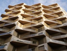 a very tall building with balconies on the sides