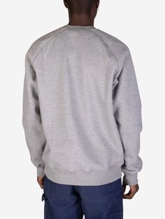 Experience the perfect blend of comfort and style with the Chase Sweatshirt from Carhartt WIP. Crafted from a premium polycotton blend, this sweatshirt features a brushed finish for an incredibly soft and cozy feel. Its relaxed fit and raglan sleeves ensure a comfortable and flattering silhouette, while the intricate knot stitch detail adds a touch of sophistication.
  58% Cotton, 42% Polyester
 Raglan sleeves
 Knotted stitch
 "C" logo embroidery
 Grey



Size & Fit:
Regular fit
 The model is 18 Gray Crew Sweats With Ribbed Cuffs, Gray Fleece Crew Sweater, Gray Crew Neck Fleece Sweater, Gray Crew Hoodie With Ribbed Cuffs, Gray Fleece Crew Sweats, Sporty Gray Sweater With Ribbed Cuffs, Gray Crew Neck Sweats For Winter, Athletic Heather Crew Sweatshirt With Ribbed Cuffs, Gray Urban Sweater For Streetwear