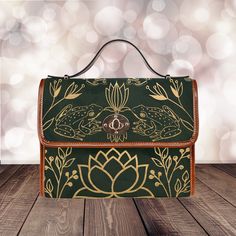 "► ABOUT THIS PURSE Colors: Green, gold, brown Design: frogs, flowers, flies, moths, leaves The design is printed on all sides using regular ink (not metallic, not glitter) in a gold color. The handle and trim are brown. The background is a mottled dark green. * Made from high-grade waterproof canvas, durable, water-resistant * Can be used as a nice laptop iPad storage bag, business briefcase, college school bag, leisure travel tote bag, crossbody messenger bag, card wallet case, etc. * Two inte Green Canvas Shoulder Bag Gift, Canvas Satchel Bag As Gift, Canvas Shoulder Bag Gift, Green Crossbody Satchel As Gift, Canvas Crossbody Bag For Gifts, Canvas Satchel Shoulder Bag As Gift, Canvas Satchel Shoulder Bag For Gift, Green Satchel With Adjustable Strap As Gift, Canvas Crossbody Bag Gift