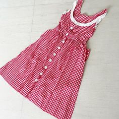 Preppy Knee-length Summer Dresses, Picnic Gingham Sundress With Ruffles, Summer Plaid Dress For Garden Party, Summer Plaid Dress With Buttons, Preppy Sleeveless Dress For Picnic, Casual Dresses With Button Closure For Picnic, Casual Dress With Button Closure For Picnic, Casual Dress With Button Closure For Picnics, Button Closure Dress For Picnic