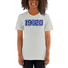 A unisex t-shirt designed for the finer women of Zeta Phi Beta Sorority Inc. This t-shrt features the year of the sorority's inception and its revered crest. Choose between the classic elegance of white or the sporty allure of athletic gray. Embrace your pride and secure one for yourself or surprise your fellow sorors with one today! Proud to be an official licensed vendor of Zeta Phi Beta. Buy with confidence. This design is printed on a Bella+Canvas 3001 Unisex Staple T-shirt. This high quality tshirt is made out of 100% combed and ring-spun cotton (Heather colors contain polyester). It is lightweight and soft and offers the perfect amount of stretch. Its pre-shrunk fabric ensures a consistent fit, while the side-seamed construction guarantees durability. With shoulder-to-shoulder taping Fitted Pre-shrunk T-shirt For College, Fitted Pre-shrunk College T-shirt, Fitted College T-shirt With School Spirit, Fitted School Spirit T-shirt For College, Pre-shrunk Sorority T-shirt With Crew Neck, Pre-shrunk Crew Neck Sorority T-shirt, Fan Apparel Short Sleeve T-shirt For College Events, Collegiate Short Sleeve Tops For College Events, Farm Fresh Pumpkins