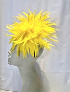 Yellow Fascinator- Wedding- Cocktail Hat -Feather Headdress- Derby Hello, This feather fascinator is about 8 inches round.  It is attached to a skinny adjustable headband that is wrapped in satin and is very comfortable.  Available in many colors. I am based in the NYC metropolitan area where I started with a shop in Soho.  I make quality accessories using the best fabrics, trims and I love to incorporate vintage items in my creations.  -------------------------------------------------- To retur Yellow Fascinator, Yellow Feathers, Rio Carnival, Burlesque Costume, Feather Headdress, Adjustable Headband, Feather Headband, Feather Fascinators, Cocktail Hat