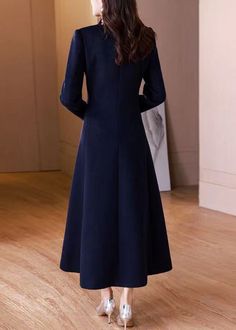 Elegant Navy Peter Pan Collar Button Woolen Long Coat WinterFabric: WoolenSize & Fit: Fit: This garment fits true to size.Length: Size S measures 49.53"from shoulder to hemBust: Great for any cup size. Waist: Loose Fit. Comfortable room throughout midsection.Hip: Loose Fit - room for hips. Hand Wash Cold. Elegant Long Sleeve Peacoat For Work, Elegant Long Sleeve Peacoat For Office, Fitted Long Sleeve Peacoat With Buttons, Fitted Single Breasted Peacoat With Long Sleeves, Elegant Office Peacoat With Long Sleeves, Wool Coat With Buttons For Workwear, Elegant Office Peacoat, Elegant Long Sleeve Wool Coat With Buttons, Elegant Tailored Peacoat With Long Sleeves