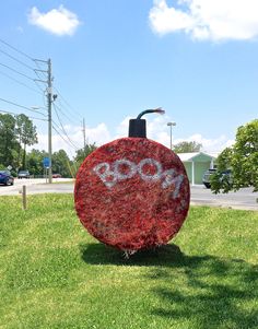 a large red object with the word boo written on it