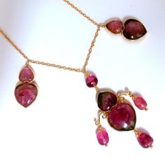 Dangling Hearts 80ct. Natural Pink Tourmaline Necklace. Hearts: 15x17mm-12x11 Semi Transparent Prime Watermelon Purple Pink 14kt Yellow Gold 21 Grams. Center Pendant Overall 2.25 X 1.25 Inch Total Necklace Length: 16 Inches $7,000 Appraisal Certificate To Accompany Pink Sapphire Pear-shaped Jewelry Gift, Fine Jewelry Pink Cabochon, Pink Gold Tourmaline Jewelry With Gemstones, Pink 14k Gold Pear-shaped Jewelry, Pink Pear-shaped 14k Gold Jewelry, Pear-shaped Tourmaline Jewelry As A Gift, Gift Pear-shaped Tourmaline Jewelry, Pear-shaped Tourmaline Jewelry Gift, Pear-shaped Tourmaline Jewelry For Gift