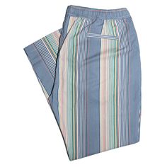 A must-have style in every man’s wardrobe, you will never look boring again with these striped jogger pants in multicolor. Elegantly made with high quality craftsmanship in a straight fit, flat-front style from premium quality cotton, these trousers feature a drawstring closure with an elastic waistband and four pockets. This pair of men's pants is perfect for work and everyday wear, summer events, parties and beach vacations. Buy it for yourself, or gift it to a loved one for an anniversary, holiday, birthday or just because. ABOUT: • Brand: Chiragh • Color: Multicolor • Features: Four pockets, elastic waistband, drawstring closure • Fit: Straight • Pattern: Striped • Closure: Drawstring • Material: Cotton, elastane • Construction: 100% HANDMADE MEASUREMENTS: Please allow a 2-3 cm differe Blue Joggers With Three Stripes For Sports, Blue Sporty Joggers With Three Stripes, Cotton Joggers With Contrast Stripes, Sporty Blue Joggers With Three Stripes Branding, Blue Three Stripes Joggers Sportswear, Beach Vacations, Men's Pants, Vest Shirt, Summer Events