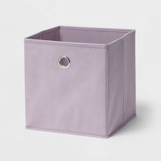 a purple storage box with a ring on the front and bottom, sitting against a white background