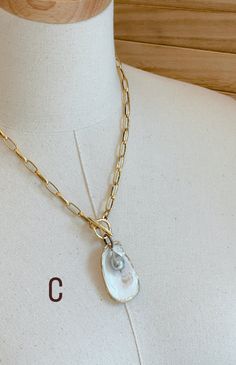 A one-of-a-kind statement piece. Hand painted gold leaf natural oyster shell pendants with gorgeous freshwater pearls, on high quality 12K Gold over brass chain with toggle front closures. Each shell has been harvested in our Charleston, SC rivers and are carefully hand finished to create its one-of-a-kind appearance. No two shells are alike. Each oyster shell as its own story behind its journey to the shore. The size, shape and colors in each one will vary and that is what makes each shell trul Journey To The Shore, Oyster Shell, Detail Shop, Shell Pendant, Shell Necklaces, Charleston Sc, Brass Chain, Gold Leaf, Charleston