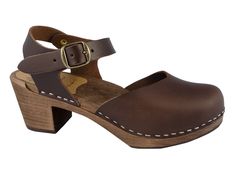 High-quality original Swedish clogs from MB Clogs, open with anatomically shaped wooden soles for optimal walking comfort at home and on the go. High-quality materials & workmanship The women's wooden clogs are made of durable materials and are of first-class workmanship. The upper material of the Klumpen shoes is made of exquisite oiled leather, the anatomically shaped footbed is made of light wood. A non-slip and abrasion-resistant profile sole made of plastic is attached under the brown-stained wooden strips of the Swedish wooden clogs. The high-quality plastic tread guarantees smooth and quiet running. Various sizes & models These comfortable natural clogs are available in all sizes from 36 to 41. We recommend ordering the larger clog if you have wide feet or are in between sizes. To e Comfortable Brown Sandals With Wooden Heel, Brown Summer Clogs, Medium Width, Rustic Brown Slip-on Clogs, Brown Open Toe Clogs With Cork-bed Midsoles, Brown Leather Clogs With 4-inch Heel, Brown Clogs With Buckle Closure, Medium Width, Garden Clogs, Swedish Clogs, Clogs And Mules