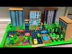 a toy city with lots of buildings and cars