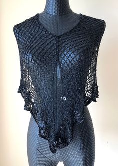 "This is a beautiful shaped cape that can be worn over jacket  or over a little black dress for that office party or Cruise Adorned with tube beads and scallop pattern, very elegant and classy Size: Longest width is 55\", fishnet edges measure 41\" each side. Condition: Brand new" Elegant One Size Cape Poncho, Elegant One-size Cape Poncho, Beaded Shawl For Parties, Elegant One Size Shawl Poncho, Elegant One-size Shawl Poncho, Elegant Black Poncho Cape, Elegant One-size Cape Shawl, Elegant Black Cape Poncho, Scarf Cape