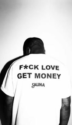 a man wearing a t - shirt that says f k love get money