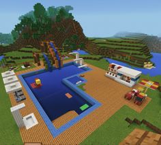 an aerial view of a house and pool in minecraft