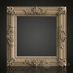 an ornate wooden frame on a black background