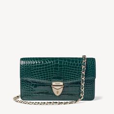 Mayfair Clutch 2 in Evergreen Patent Croc | Aspinal of London Luxury Evening Bags With Leather Lining, Luxury Formal Bags With Palladium Hardware, Evening Bags With Leather Lining, Luxury Evening Bags In Textured Leather, Timeless Rectangular Everyday Luxury Evening Bag, Luxury Evening Bag For Business, Timeless Evening Shoulder Bag In Textured Leather, Classic Rectangular Clutch With Palladium Hardware, Classic Rectangular Clutch For Everyday Luxury