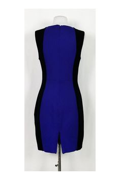 Take this chic dress straight from the office to after-hours. Made in a color-blocked design, it can be styled with silver-tone accessories. Size 8 69% rayon, 29% nylon, 2% spandex Rounded neckline Sleeveless Back zipper Lined Above knee Bust 34" Waist 29" Shoulder to hem 35" Elegant Color Block Party Dress, Elegant Color Block Mini Dress For Party, Chic Color Block Mini Dress For Party, Elegant Fitted Color Block Mini Dress, Elegant Color Block Evening Dress, Elegant Evening Color Block Dress, Fitted Color Block Evening Dress, Fitted Color Block Dress For Evening, Elegant Mini Length Color Block Dress