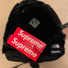 Supreme X Northdace Black Faux Fur Backpack. Never Sued And Still Has Tags Comes With Two Supreme Stickers Black Travel Bag With Logo Patch, Black Bags With Logo Patch For Daily Use, Black Everyday Bags With Logo Patch, Everyday Black Bags With Logo Patch, Luxury Black Bags With Logo Patch, Black Backpack With Logo Patch, Black Standard Backpack With Logo Patch, Black Streetwear Bag With Logo Patch, Black Rectangular Bag With Logo Patch