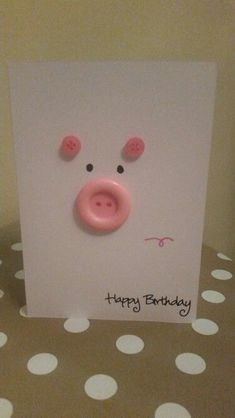 a card with a pig face on it