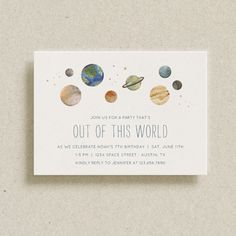 an out of this world birthday party card with the planets in white and blue on it