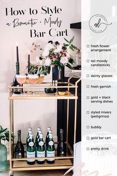 a bar cart with bottles and flowers on it, labeled how to style an elegant money bar cart