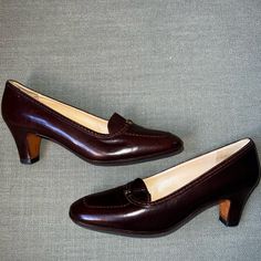 Vintage Gucci 1970’s Kitten Heel Loafers. Mahogany Brown. Size 37 B. 2 Inch Heel. Good Condition, Soles Inside And Out Fully Intact. Slight Wrinkle In The Leather. No Obvious Scratches Or Damage. Hand Written Serial Number Inside. Classic Heels For Galas, Vintage Heels With Brogue Detailing And Almond Toe, Vintage Pointed Toe Heels With Brogue Detailing, Vintage Almond Toe Heels With Brogue Detailing, Vintage Leather Heels With Brogue Detailing, Vintage Fall Loafers With Brogue Detailing, Fall Vintage Loafers With Brogue Detailing, Retro Closed Toe Loafers For Work, Retro Almond Toe Court Shoes For Formal Occasions