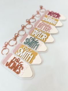 several key chains with different types of words on them