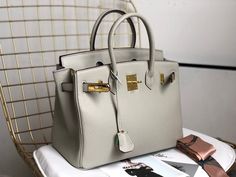 Size: 25cm OR 30cm OR 35cm It comes with Dust box, Care manual, Tag, and Paper bag. Luxury Medium Beige Bags, Medium Luxury Beige Bags, Medium Beige Luxury Bags, Luxury Medium Shoulder Bag, Luxury Formal Bags, Luxury Formal Medium-sized Bags, Luxury Formal Bag, Elegant Medium Bags With Gold-tone Hardware, New Handbags