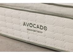 an avocado mattress is shown with the label on it's inner side