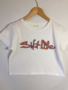 Salt Life Cropped Tee White Graphic Cropped T-shirt For Everyday, Graphic Tee Cropped T-shirt With Slogan, White Cropped T-shirt With Slogan, White Cropped T-shirt With Logo Print, White Cropped T-shirt With Text Print, Urban Threads, Cropped Tee, Salt Life, Cropped Tube Top