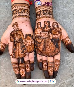 two hands with henna designs on them