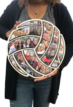 a woman holding up a plate with photos on it in front of some grass and trees