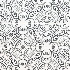 black and white wallpaper with an intricate design on it's surface, in the middle