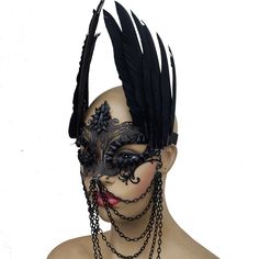 This sumptuous headdress is a true masterpiece. Ideal for ball masks, the Burning Man outfit, or Halloween costumes. The delicate feathers and elegant design create an atmosphere of mystery and allure.      It's not just a mask, but a statement piece that will make you the center of attention at any event. Whether you're aiming for a glamorous look or a spooky vibe, this headpiece is the perfect accessory to enhance your style and make a lasting impression. Let it bring out the best in you and a Ball Masks, Black Masquerade, Black Masquerade Mask, Wings Black, Ball Mask, Man Outfit, Burning Man Outfits, Outfit Halloween, Feather Wings