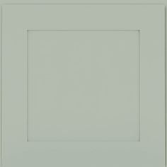 an empty white square frame on a wall