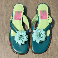 Brand New Vintage Lilly Pulitzer Leather Thong Style Sandals Size 6. Perfect Condition But There Are A Few Extremely Small Scratches On The Heels- So Small I Couldn’t Get Them To Show In Pix. Teal Green With A Light Mint Color Leather Flower On Top. 3/4” Heel. Vintage Lilly Pulitzer, Vintage Sandals, Flower Sandals, Green Heels, Leather Flower, Leather Heels Sandals, Embellished Sandals, Leather Flowers, Mint Color