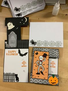 halloween cards and envelopes on a table