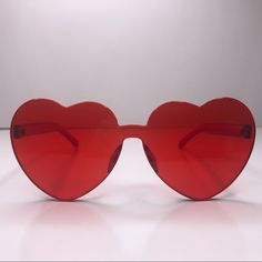 These Make A Cute Valentine's Day Gift! Red Oversized Rimless Heart Shaped Glasses. Such A Fun Piece! Perfect Way To Boost Your Mood. Fun For Girls Trips, Bachelorette Parties, Birthday Parties & Concerts, Festivals & Everyday Use. 100% Resin & Frame Brand New, Never Worn. Brand Unknown. See My Closet For Other Colors. Valentines Day! Fun Red Heart-shaped Sunglasses, Fun Red Sunglasses For Valentine's Day, Red Rimless Sunglasses For Party, Red Plastic Sunglasses For Valentine's Day, Red Heart-shaped Sunglasses For Valentine's Day, Casual Red Sunglasses For Valentine's Day, Red Heart-shaped Tinted Sunglasses, Valentine's Day Red Casual Sunglasses, Trendy Red Sunglasses For Valentine's Day